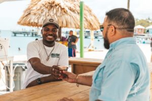 serving a beer at lobsterfest on the point beach